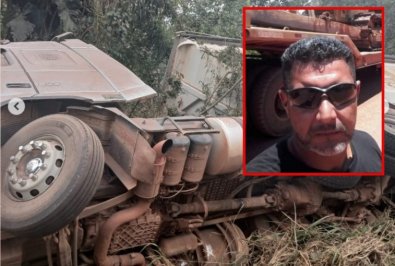 carreta tombada-motorista morre.jpg
